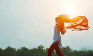 healthy woman outside under sun